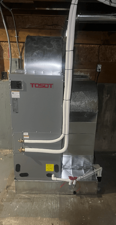 central heat pump with. air handler in the basement