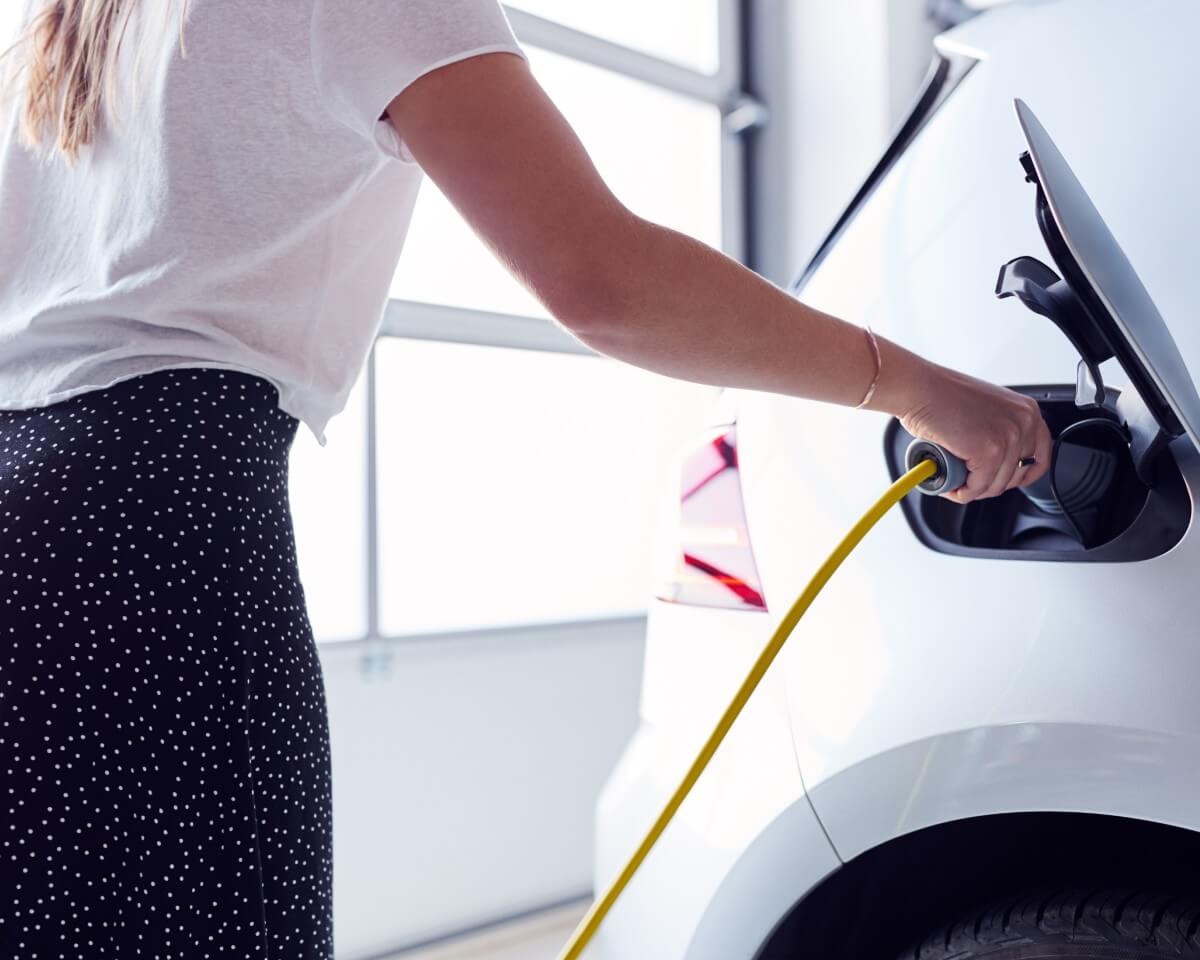 electric vehicle charger installed in a residential garage for convenient home charging
