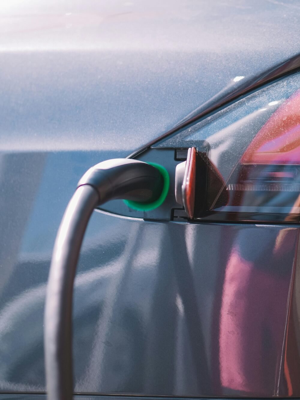 electric vehicle connected to charger at a home in newfoundland