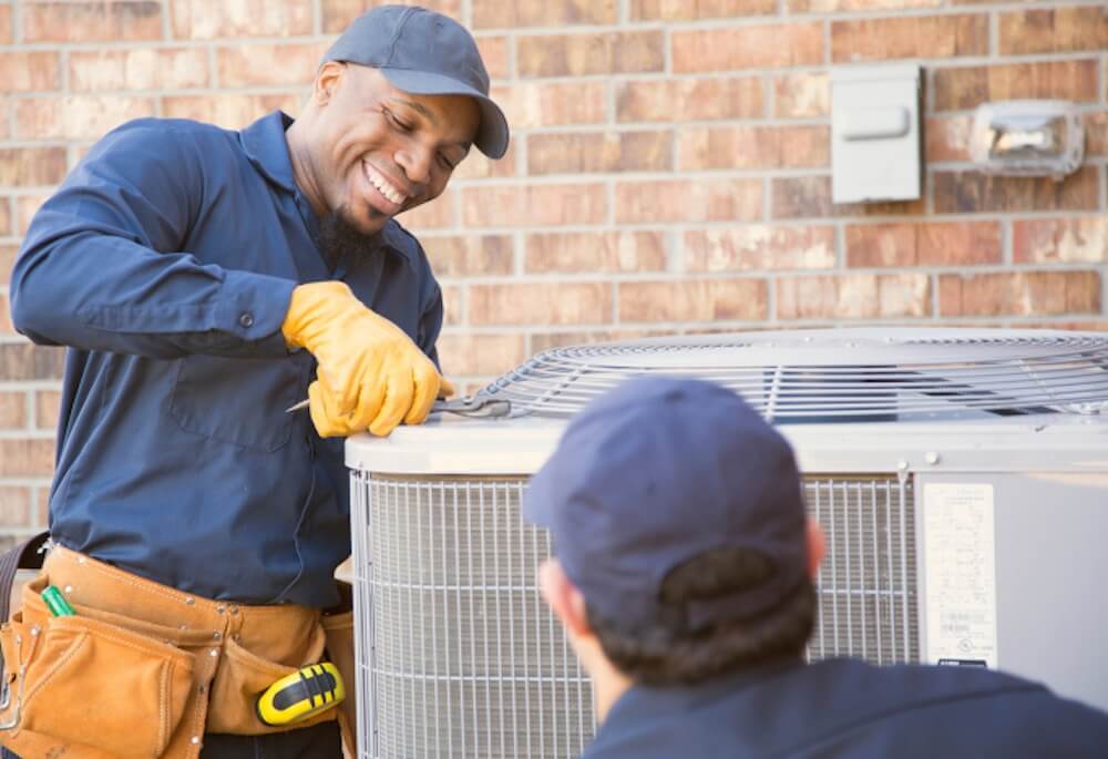 certified hvac technicians servicing heat pump and ac units