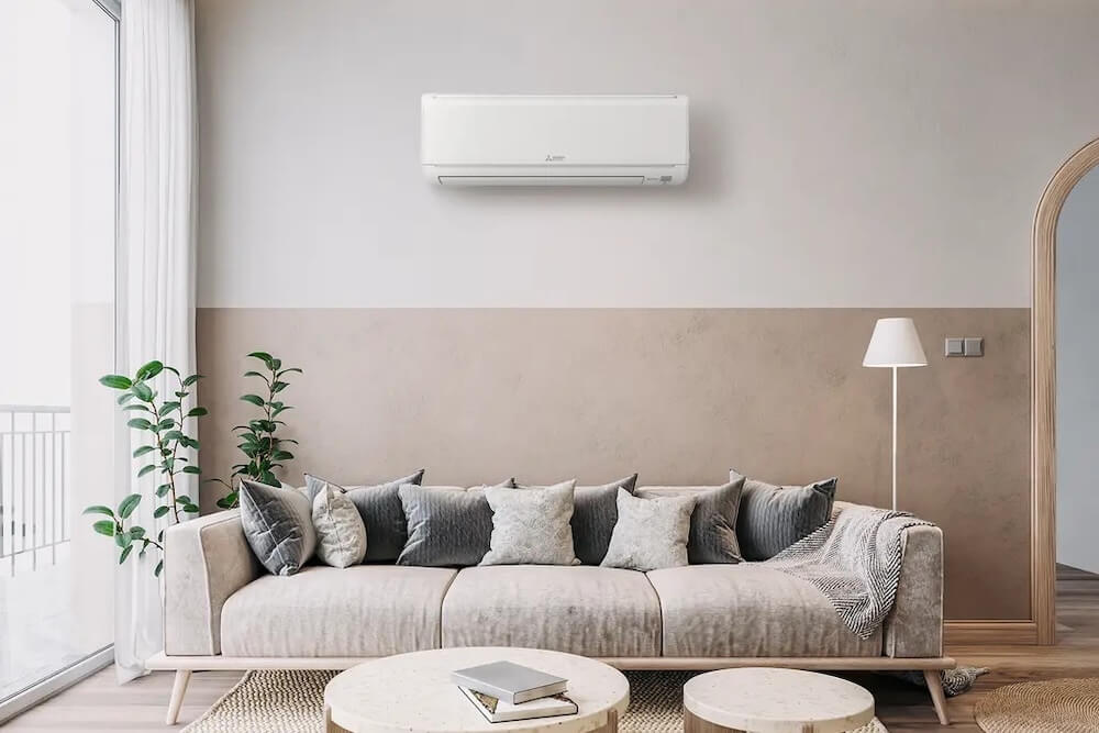 mini split unit mounted on interior wall for efficient room heating and cooling