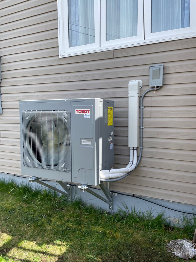Tosot outdoor heat pump unit for efficient home heating and cooling